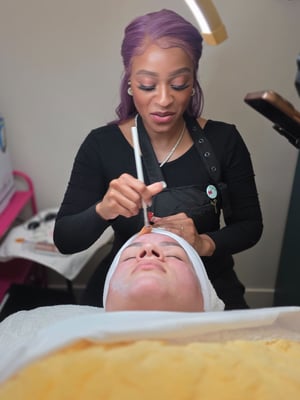 SWINA graduate Desteny Austin working on a client